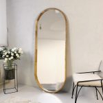 Growth mirror capsule in a wooden frame